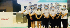 MayAir air purifiers and HVAC equipment displayed at a trade show booth with company staff, showcasing innovative air quality solutions and Chinese manufacturing expertise.